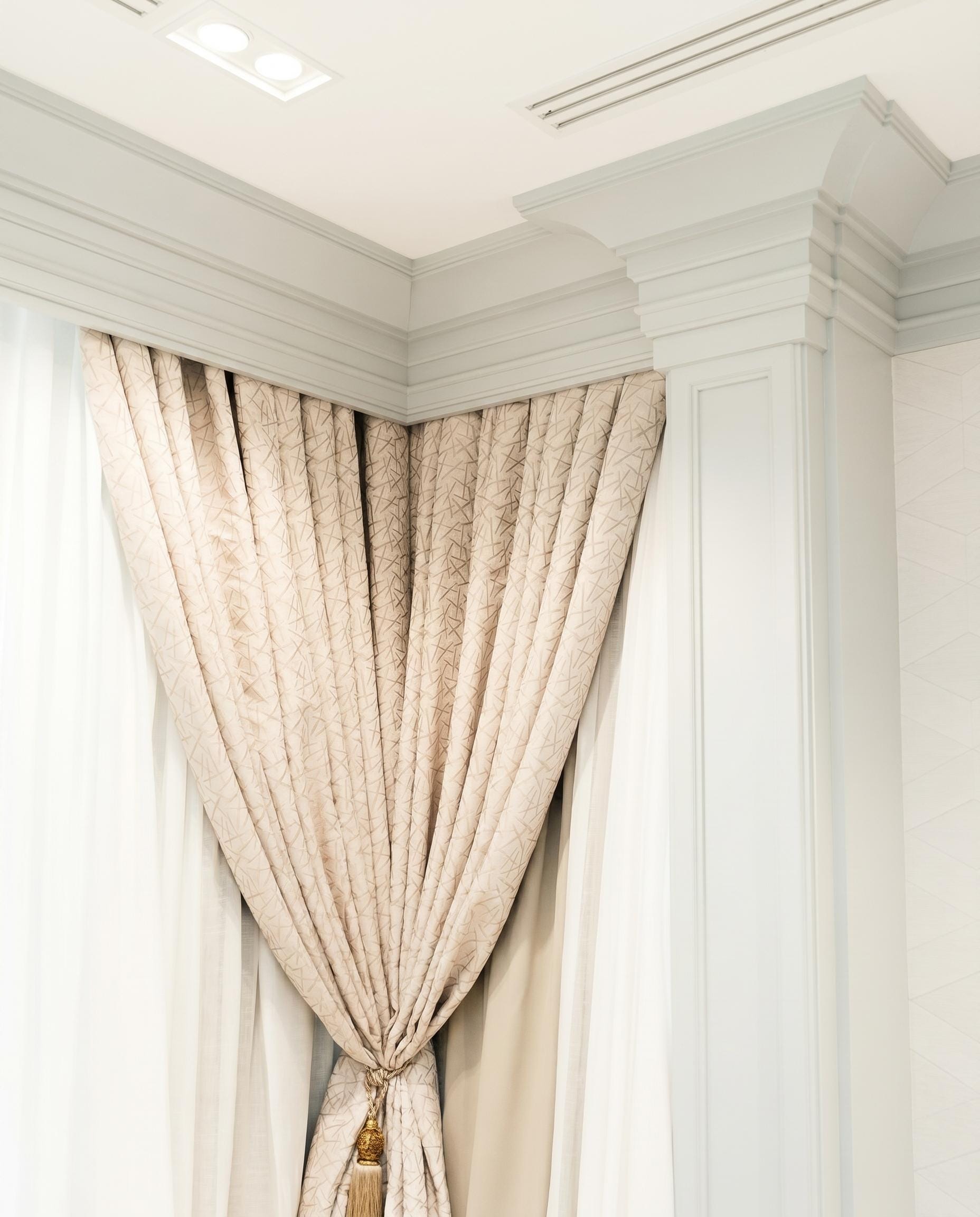 Private Bank — cream curtain — pelmet detail
