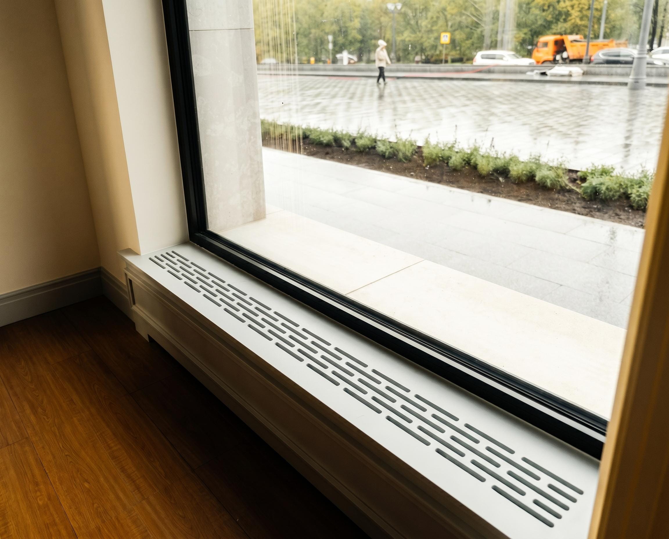 Private Bank — window reveal — radiator grille