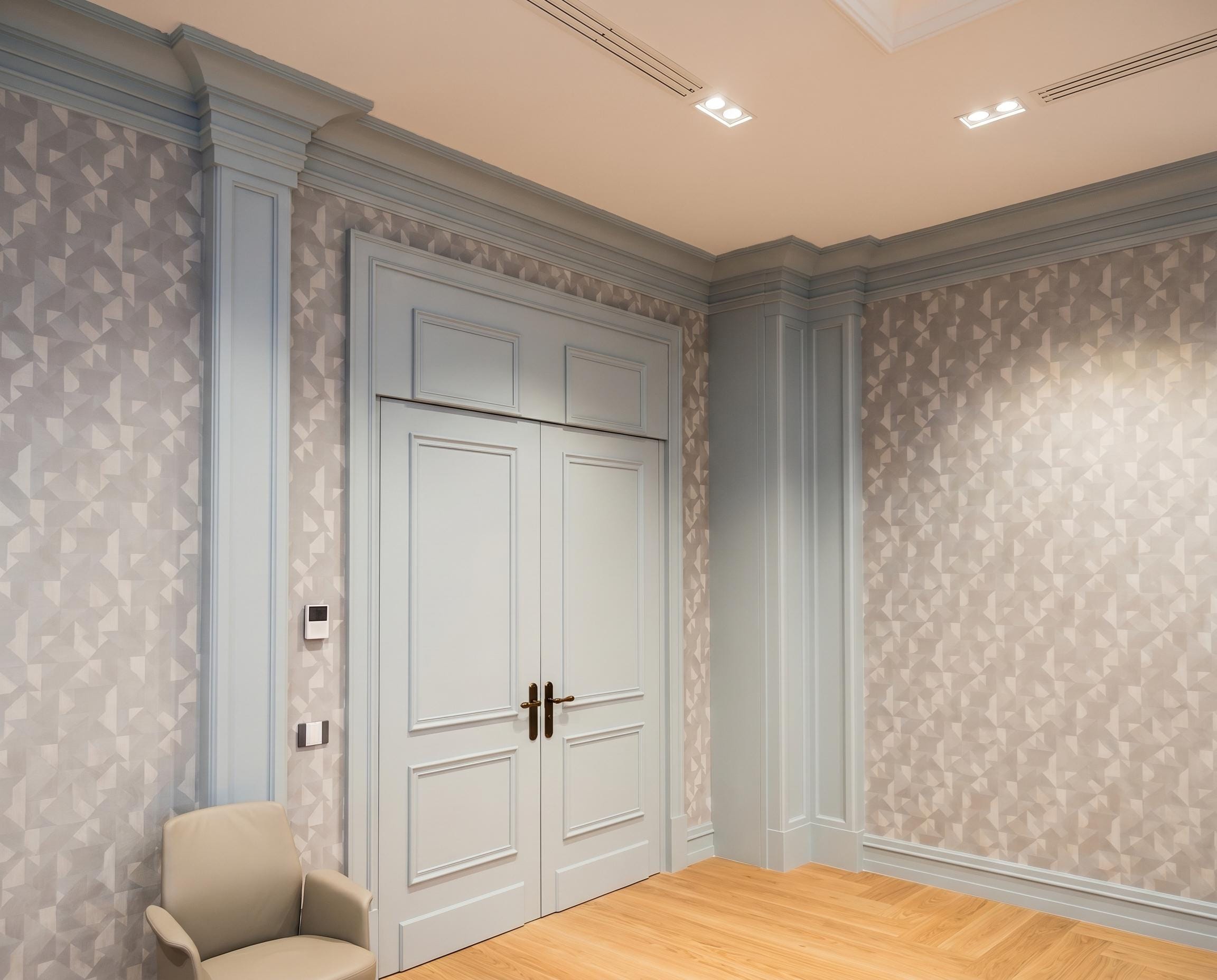 Private Bank — wallpapered room — blue-grey panelling