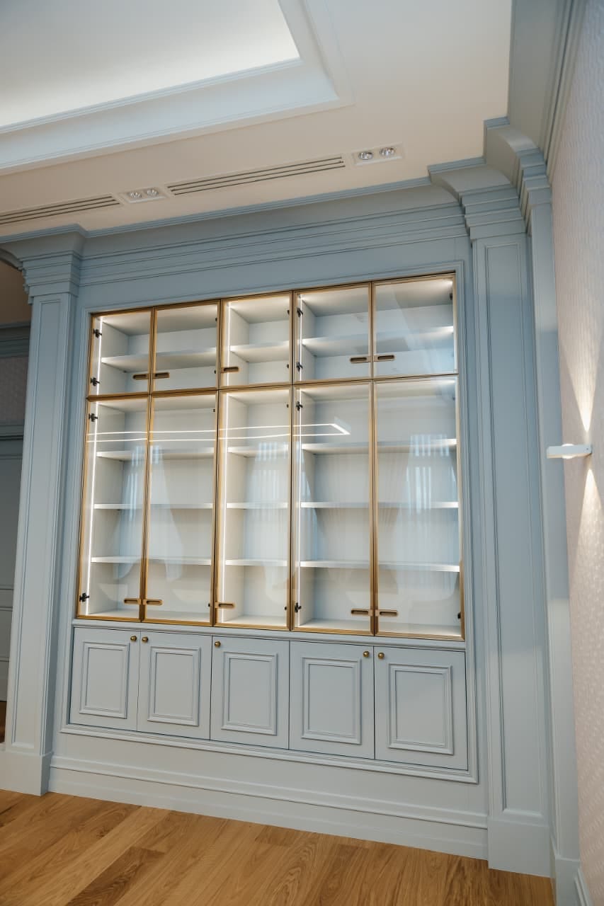 Private Bank — glazed cabinet — brass frame, built-in