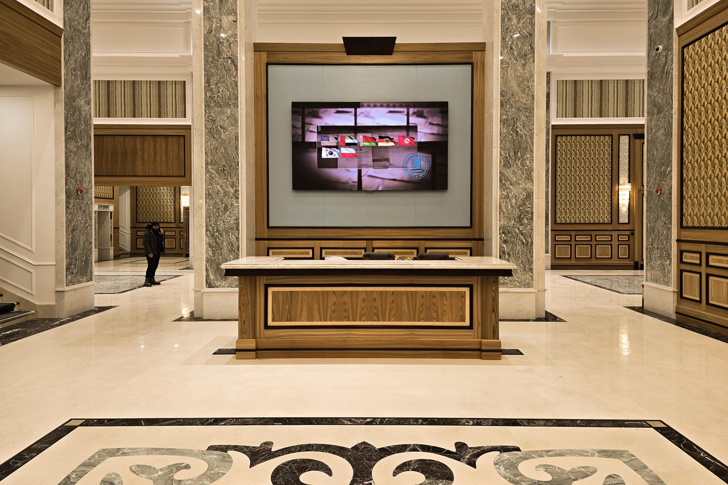 State Archive — lobby — gold panelling with screen