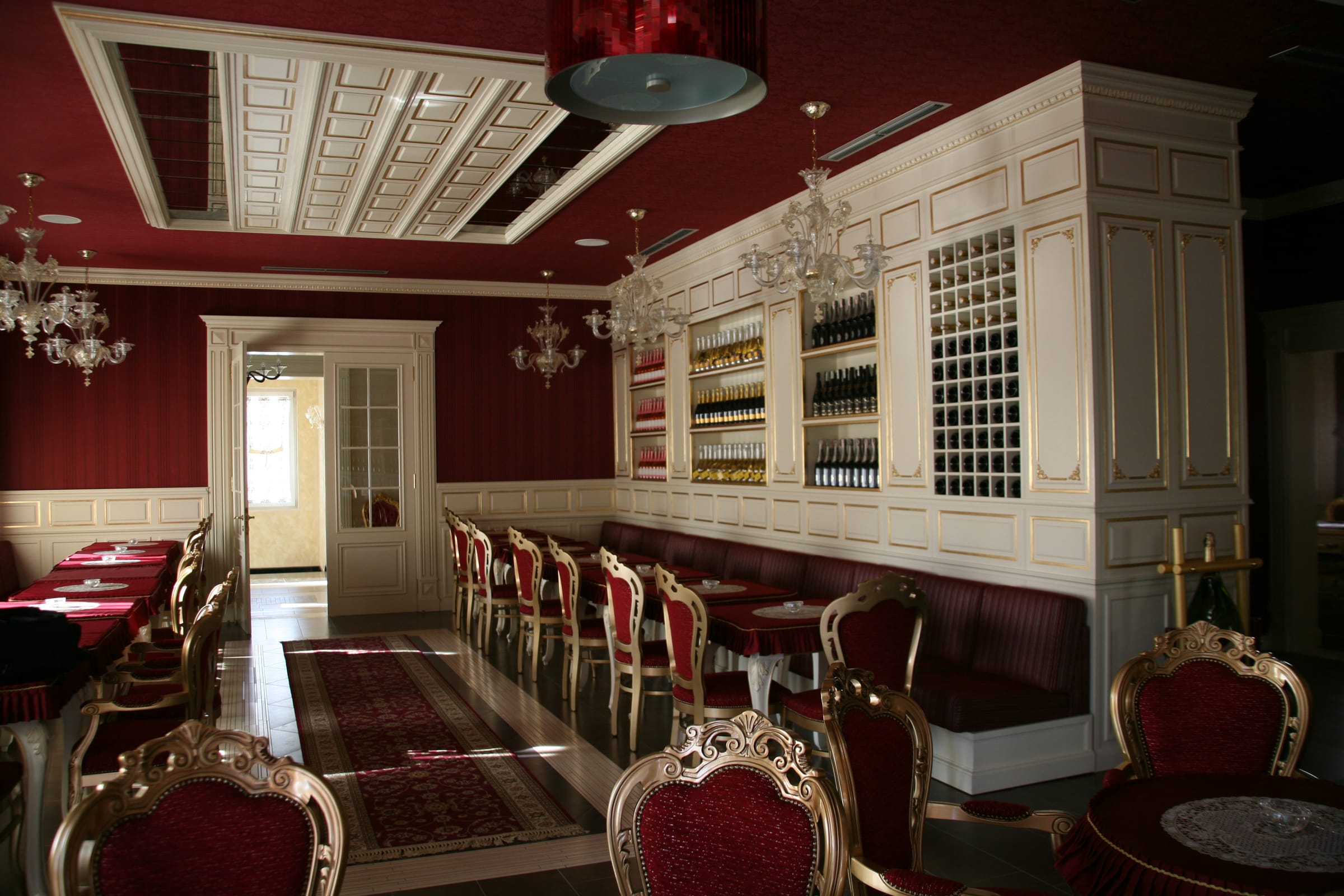 Vila Alehandro — bottle shelving — cream and red